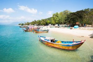 One of the distinctive features of Nhu Tien Beach is the presence of large boulders and rock formations scattered along the shoreline.