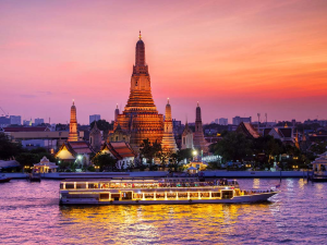 Take a boat ride on the Chao Phraya River to see the cityscape of Bangkok