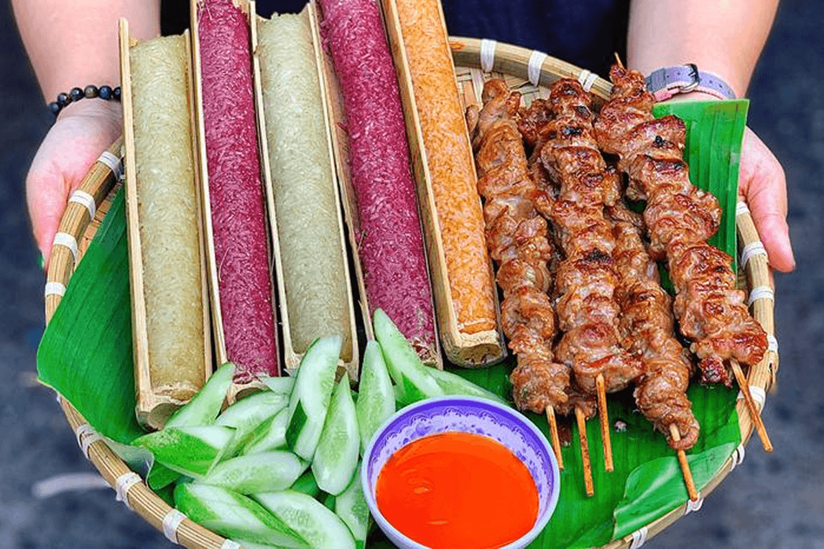 sapa street food com lam bamboo sticky rice grilled over fire