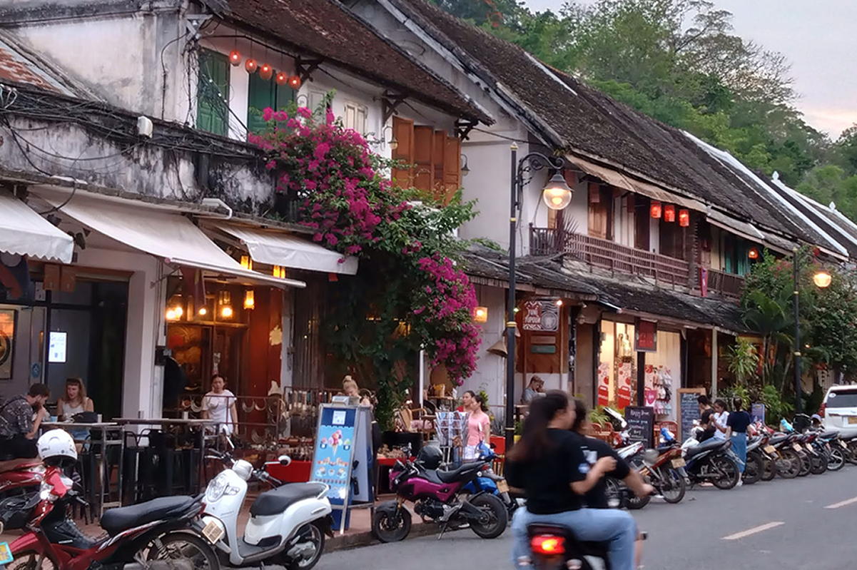 Luang Prabang city in Laos with temples and riverside scenery