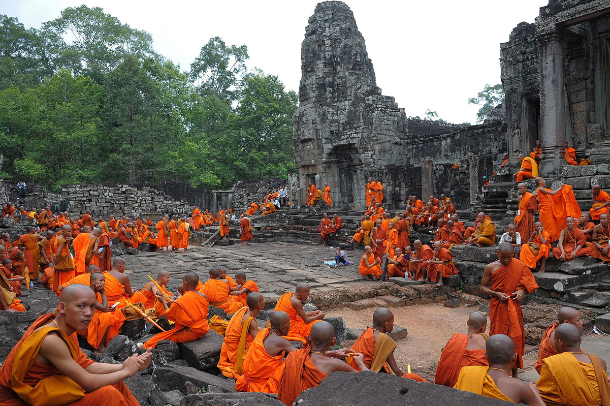 Monks performing traditional rituals at Bayon Temple