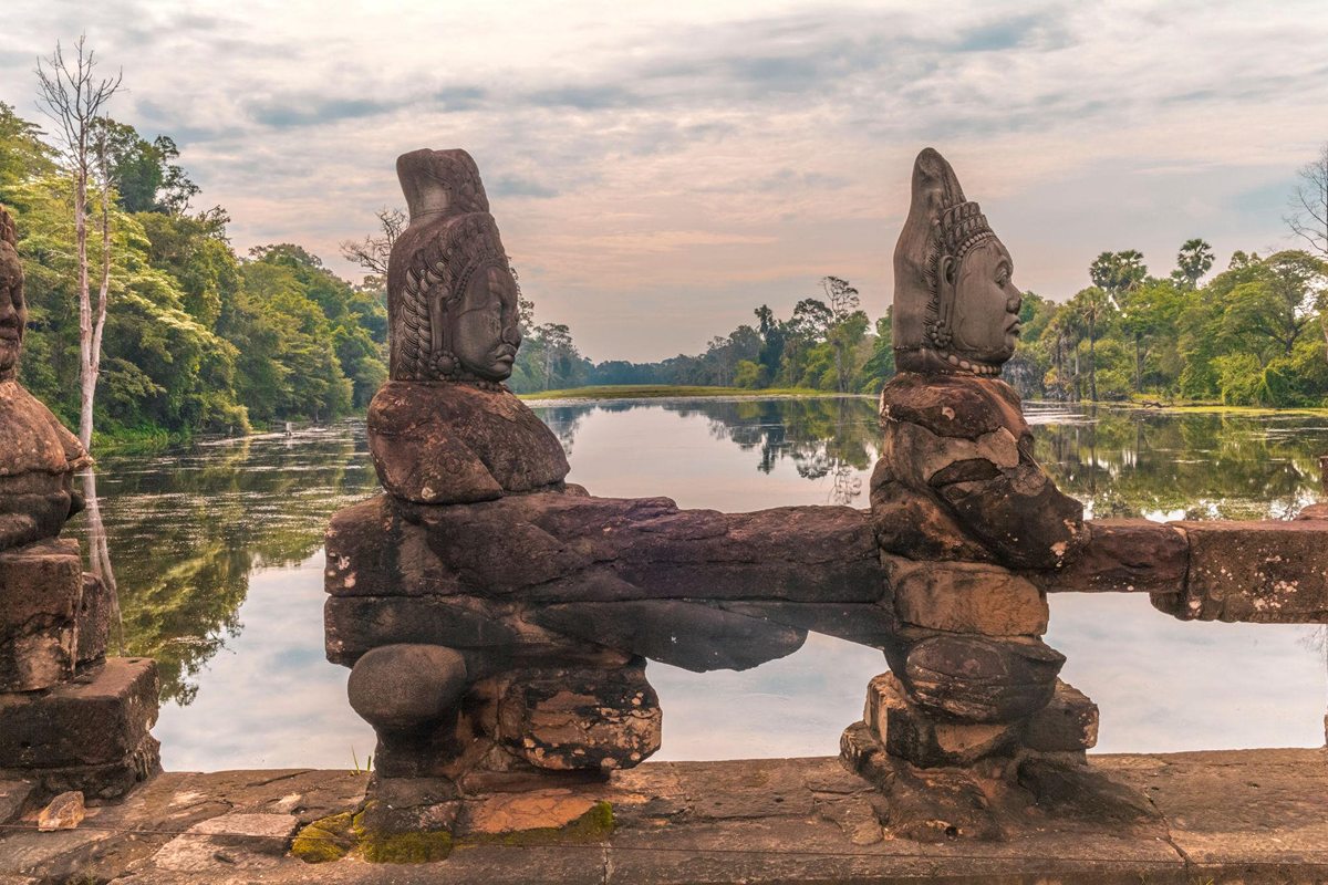 Sunrise light shining over Bayon Temple towers