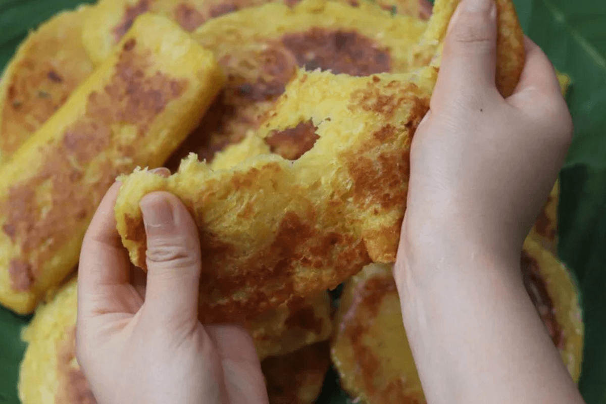 Vietnam corn cake street food being grilled on charcoal
