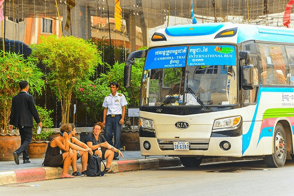 Tourist riding a vehicle toward Bayon Temple entrance