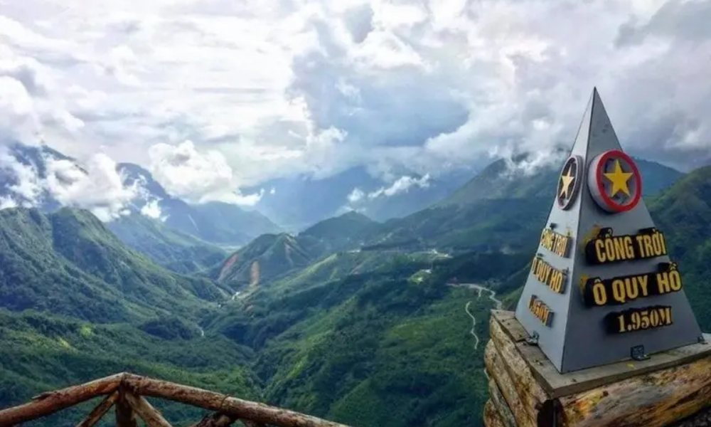 The image shows the "Gateway to Heaven" opening up to the natural landscape of Northwest Vietnam