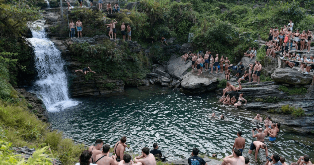 jumping into du gia waterfall